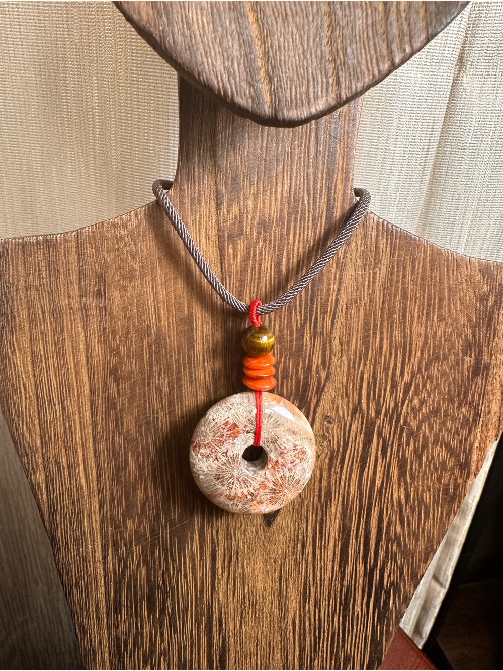 Handcrafted Red and Brown Coral Fossil Donut Pendant Necklace on Brown Rope - Picture 8 of 16